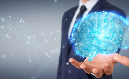 Businessman on blurred background using using digital 3D projection of a human brain 3D rendering